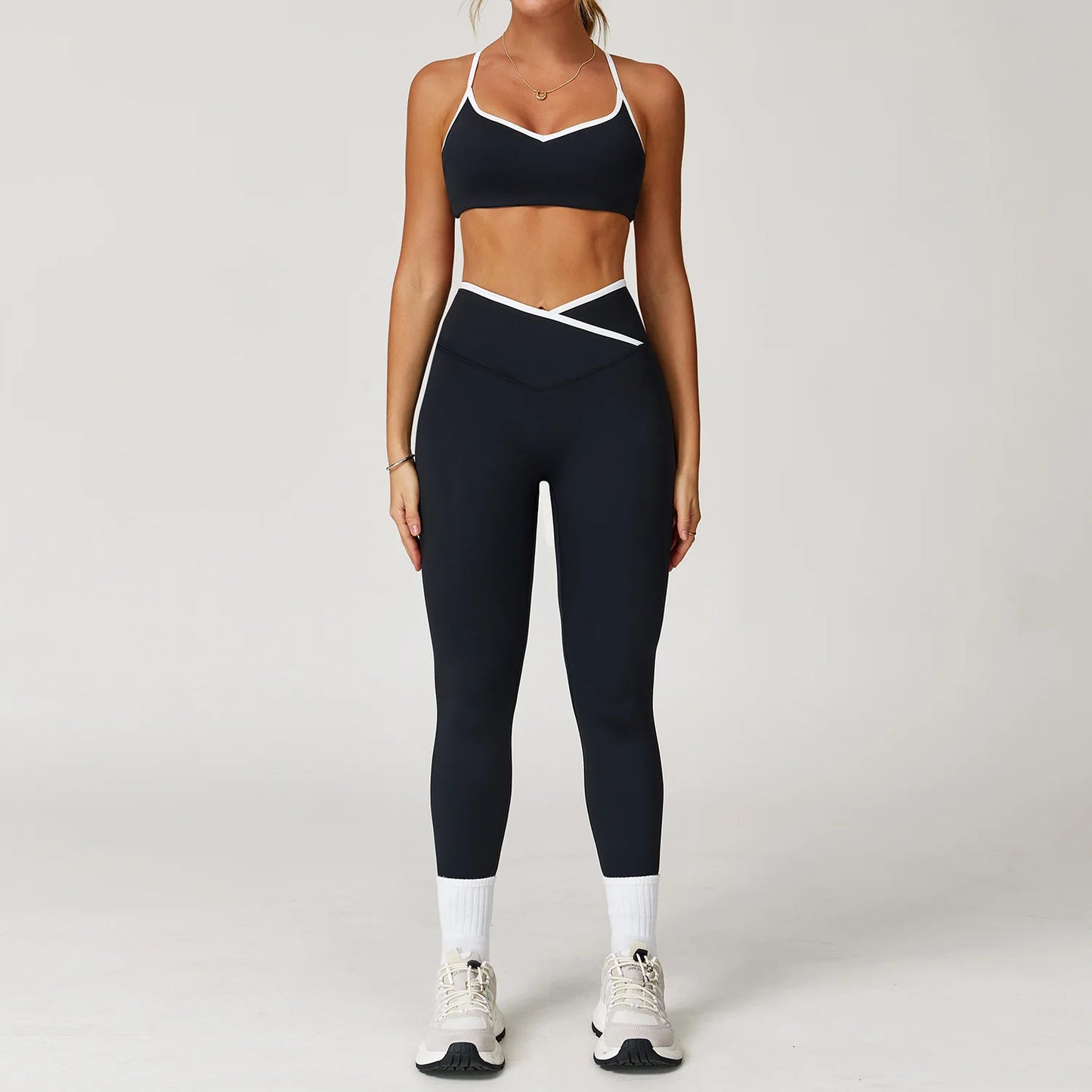 Conjunto de ioga feminino 2 peças — roupa de treino com calças de cintura alta e boca de sino, look sexy para fitness e ginásio.